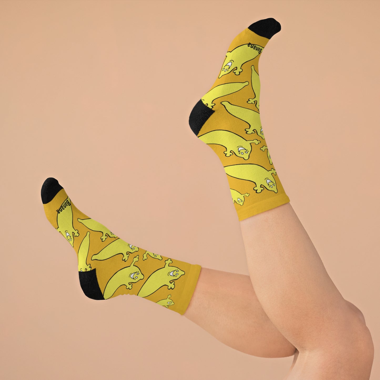 "WE'RE ALL BANANAS HERE" Unisex Crew Socks by The Dumb Banana